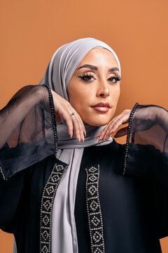 Young muslim woman looking at camera.