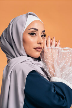 Young muslim woman looking at camera.