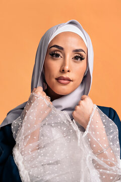 Young muslim woman looking at camera.