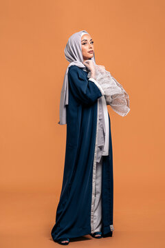 Young muslim woman looking at camera.