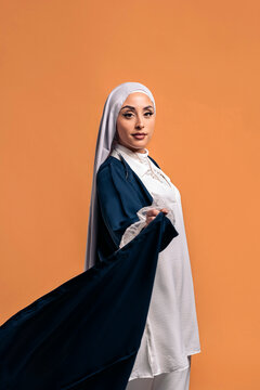 Young muslim woman looking at camera.
