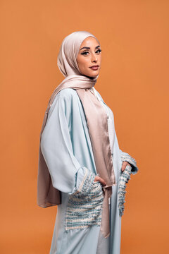 Young muslim woman looking at camera.