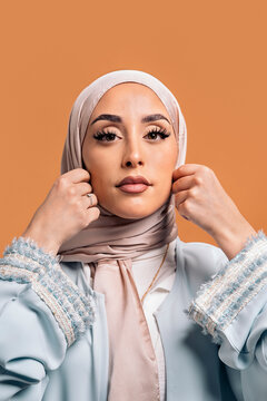Young muslim woman looking at camera.