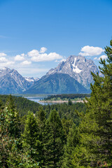 The Teton mountain range rises above Jackson Lake near Grand Teton National Park near Jackson Hole, Wyoming