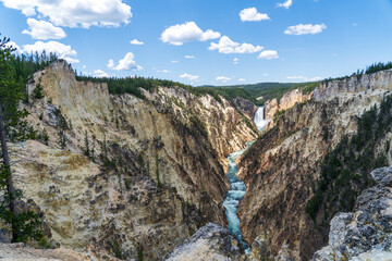 The Lower Falls waterfall on the Yellowstone River crashes down in the Grand Canyon of the Yellowstone in Yellowstone National Park in Wyoming