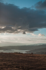 Obraz premium Scenic view of the canyon and river in the mountains. Mountain Lake in canyon in Dagestan. Picturesque view of sky with clouds