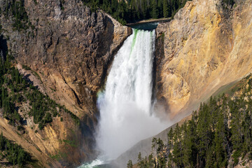The Lower Falls waterfall on the Yellowstone River crashes down in the Grand Canyon of the Yellowstone in Yellowstone National Park in Wyoming