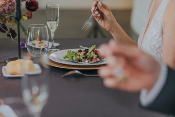 wedding reception plated dinner up close details of chef finishing food 