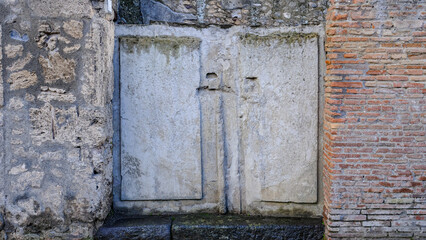 Italy, Pompeii - October 2021: Cast of workshop door. Pompeii excavations