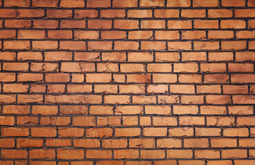 Obraz premium Rough brown brick wall background texture