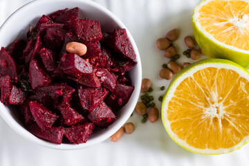 Sauteed Beetroot vegetable garnished with butter,Indian spices,peanuts,green gram lentil,mint and...