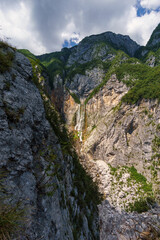 Fototapeta na wymiar Famous waterfall slap Boka on sunny summer day in Julian Alps in Triglav National park, Slovenia