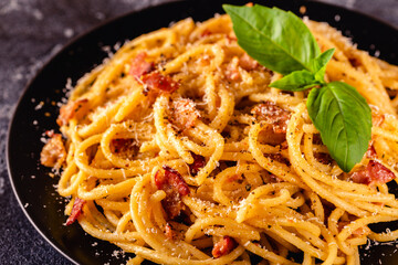 Homemade сarbonara pasta with pancetta, egg, hard parmesan cheese and cream sauce
