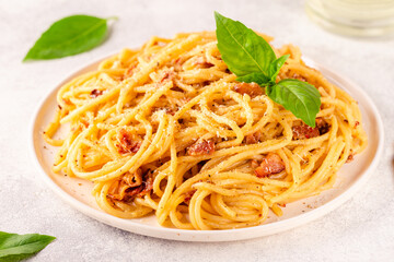 Homemade сarbonara pasta with pancetta, egg, hard parmesan cheese and cream sauce