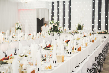 Interior of a restaurant prepared for wedding ceremony