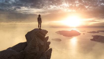 Adventurous Woman on a Rocky Mountain overlooking ocean coast. Adventure Composite. 3d Rendering Peak and Aerial Image of landscape from British Columbia, Canada. © edb3_16