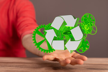 Mechanism green gears and cogs at work on black background. Industrial machinery