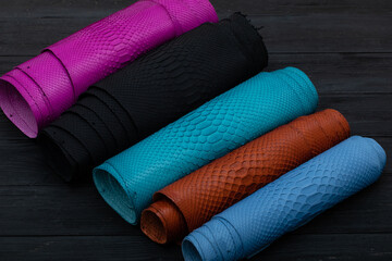 Colorful rolls of python leather.