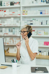 Portrait of a beautiful senior female pharmacist working in a pharmacy