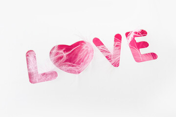 word Love , pink text on white background