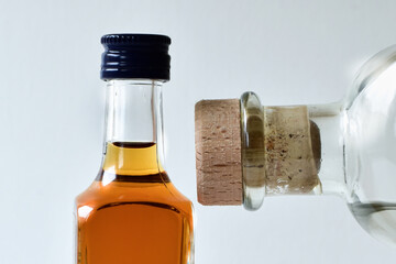 Two bottles with alcohol close up