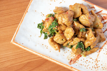 Stir-fried fish balls with basil, handmade in traditional Thai style