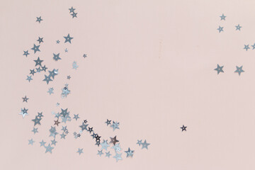 Silver stars on pink background, greeting card template with empty space for text
