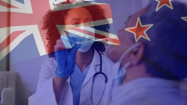 Animation of flag of australia with female doctor in face mask giving male patient covid swab test