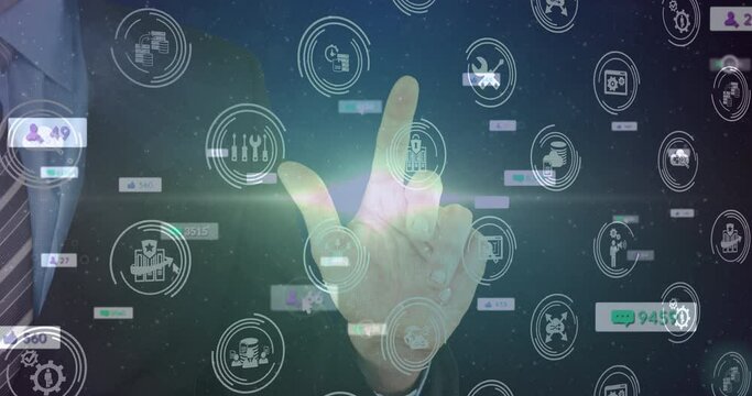 Animation of social media icons and numbers over businessman touching interactive screen