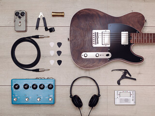 Flat lay with electric guitar and accessories
