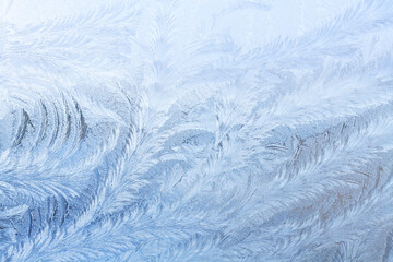Beautiful frosty pattern on the window. Ice pattern. Texture.