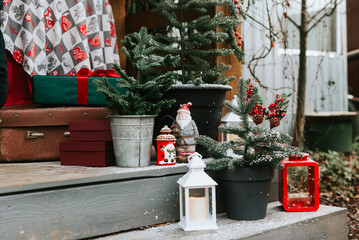 the porch of the rural house decorated for Christmas
