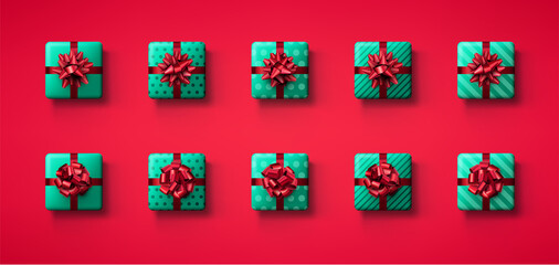Set of green isolated gift boxes with red bows.