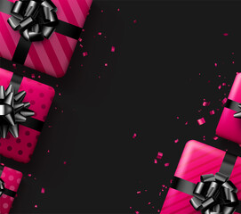 Pink gift boxes with black bow.