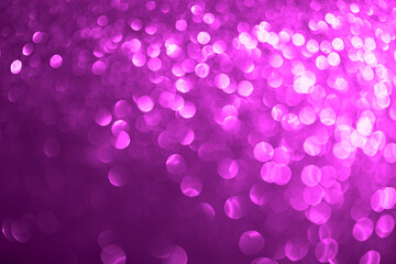 Festive abstract blurred glitter background violet color. Bokeh effect. Holiday decoration concept.