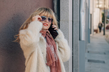 woman talking on mobile phone in the street