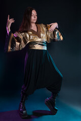 Stylish and daring image, futuristic fashion. A young woman in a multicultural outfit mixing Asian...