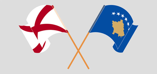 Crossed and waving flags of The State of Alabama and Kosovo