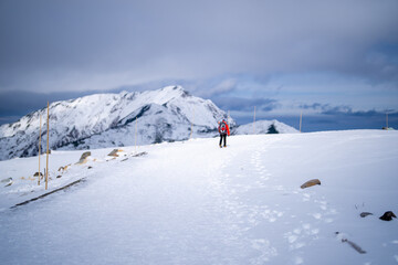 富山県立山町にある立山の冬の雪景色のある風景 Landscape with snowy winter scenery of Tateyama in Tateyama Town, Toyama Prefecture, Japan.
