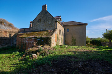 Fototapeta premium Old abandoned farm house building