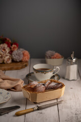 Fresh brioche in a wooden wrapping