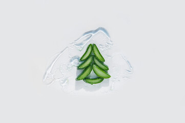 Many slices of aloe vera in texture of a cosmetic serum, gel close-up... Aloe Vera slices Christmas...