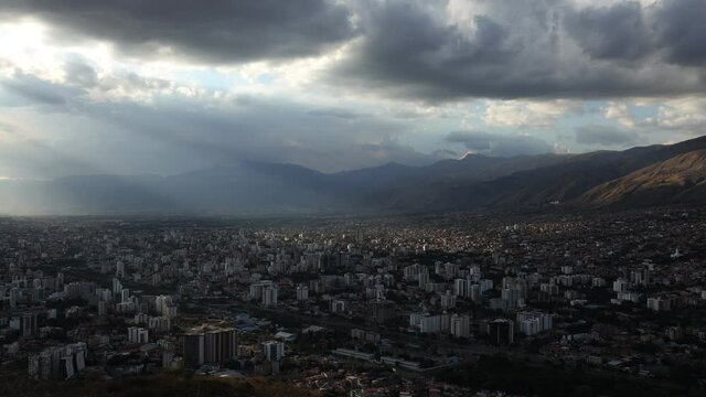 Cochabamba Bolivia South America cinematic cityscape timelapse video cloudy afternoon during golden hour shortly before sunset