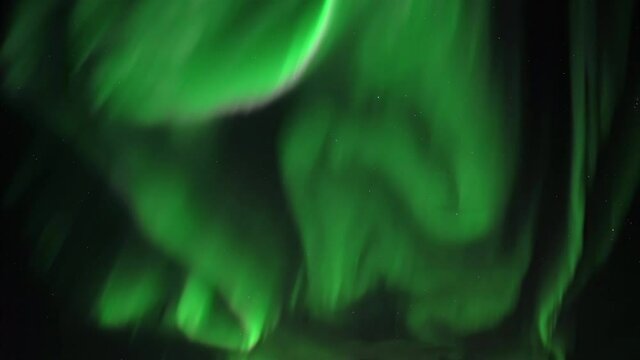 Bright full sky green and pink aurora borealis real-time video