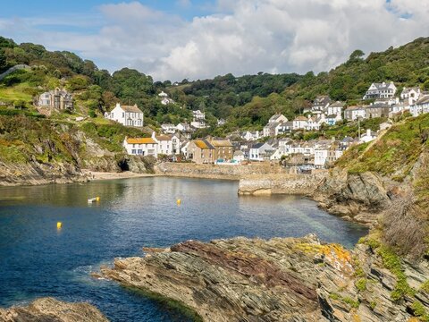 A calm bright day at the inlet of Polperro in Cornwall, UK