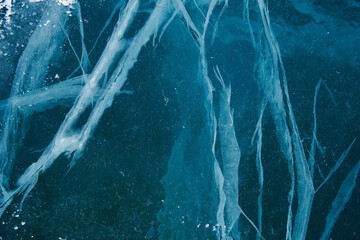Texture of winter ice surface. Blue natural ice background
