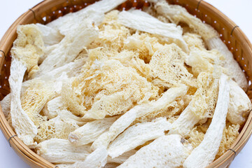 Dried tropical stinkhorn mushroom in bamboo basket