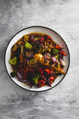 vegan roast with mixed fresh vegetables freshly picked from the garden, healthy plant-based food and locally grown