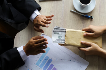 Corruption and Bribery,Businessman manager refusing receive money dollar bills to deal contract