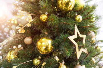 Modern Christmas tree decoration. Christmas decorations in gold color.heart and stars decoration .